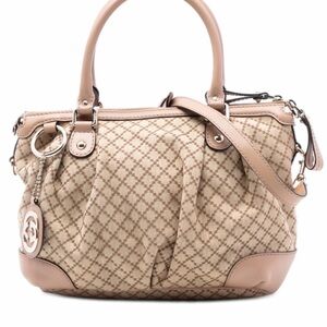 Vintage Gucci Diamante Canvas
Sukey satchel